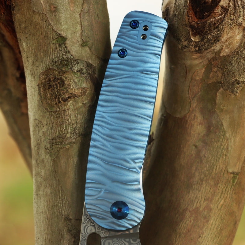 KANSEPT Orlok Thumb Hole Blue Anodized Titanium with Micro Rock Texture(3.03" Damascus) Terry Cour II Design- K2111A5