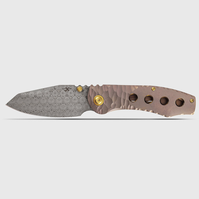 Kansept Caveman | Frame Lock | Rose Gold Anodized and Stonewashed Titanium with CNC-machined Rock Pattern | 3.57" Damascus Blade |  Jesse Pauley Designed | K1110A6