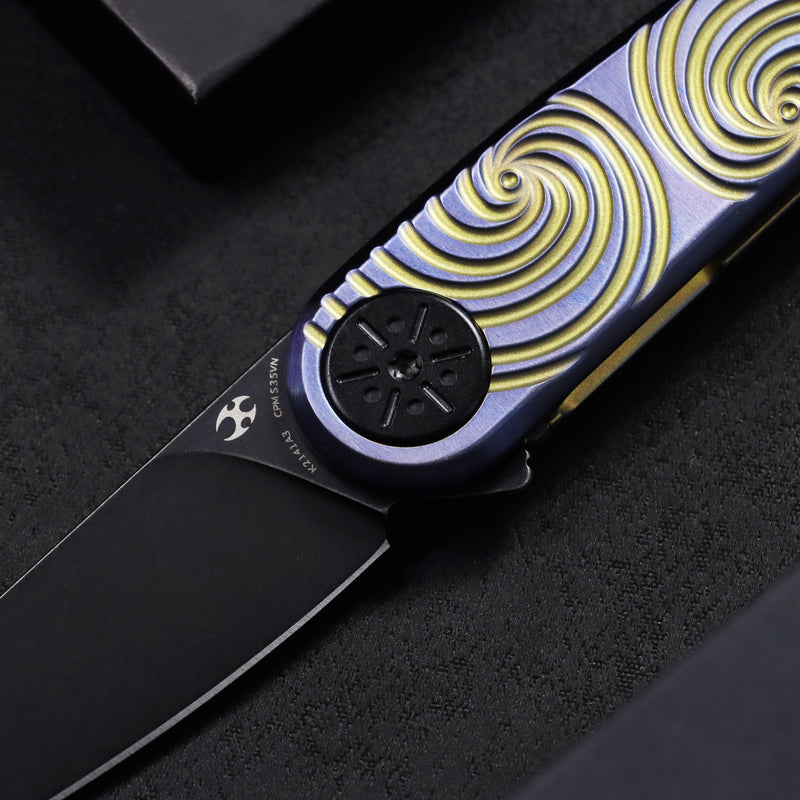 Symétrix | Frame Lock | Blue Anodized Titanium with Gold Swirl Pattern | 2.85" CPM S35VN | Alain André Design | K2141A3