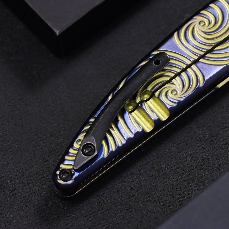 Symétrix | Frame Lock | Blue Anodized Titanium with Gold Swirl Pattern | 2.85" CPM S35VN | Alain André Design | K2141A3