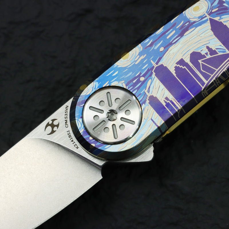 [Preorder Ship by June 15th] Kansept 2026 Blade Show Atlanta Exclusive Symétrix | Limited to 100 pcs | Titanium with Anodized Art with Custom "Starry Night Over Atlanta" Motif |2.8'' Satin S35VN Blade | Alain André Design | K2141BS1