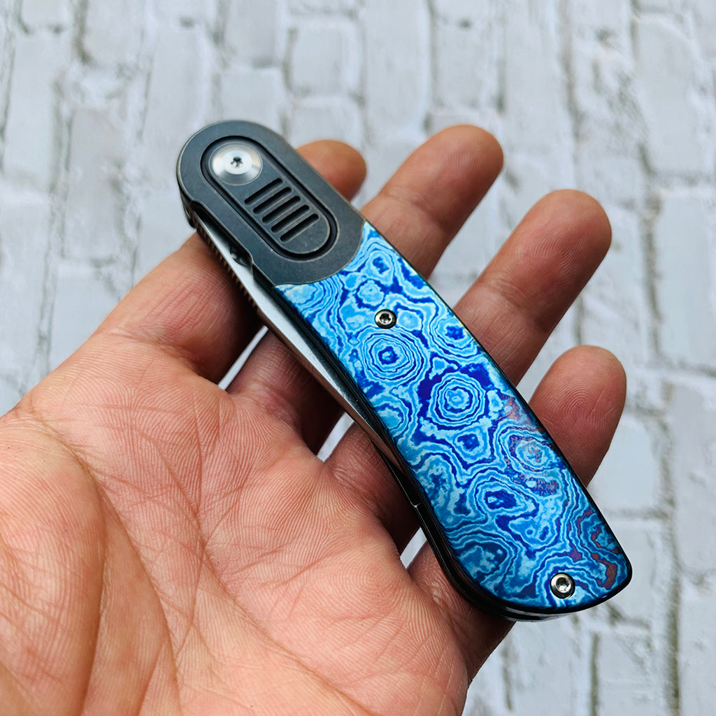 Reverie K2025A4 Black anodized Titanium Bolster + Timascus Scales