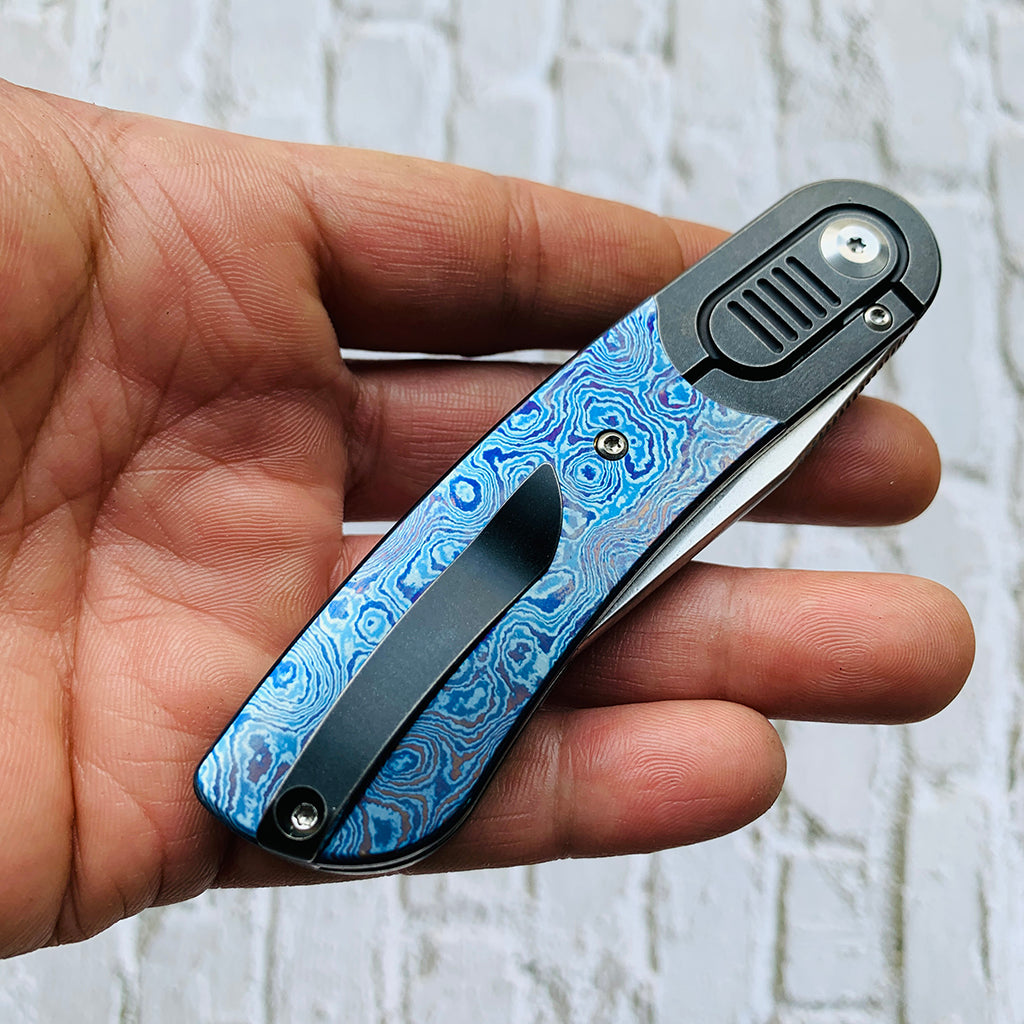 Reverie K2025A4 Black anodized Titanium Bolster + Timascus Scales