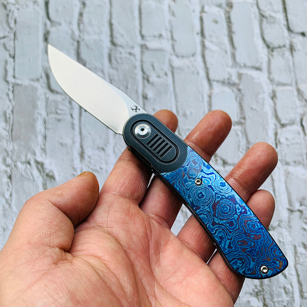 Reverie K2025A4 Black anodized Titanium Bolster + Timascus Scales