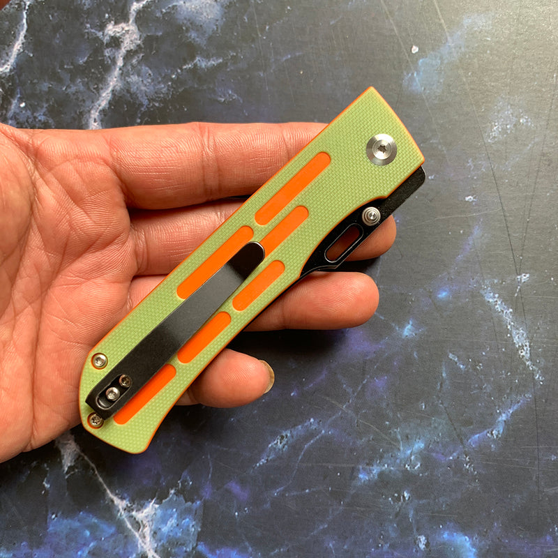 Reedus T1041A3 Black TiCn Coated and Stonewashed 154CM Blade Green and Orange G10 Handle with D.O.C.K. Design
